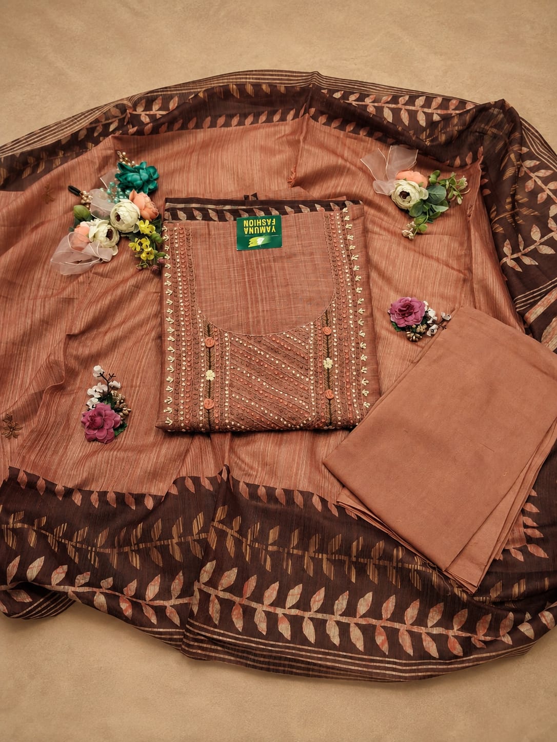 Premium Cotton Silk with a beautifully printed dupatta makes this unstitched dress a classic addition to your ethnic wardrobe.