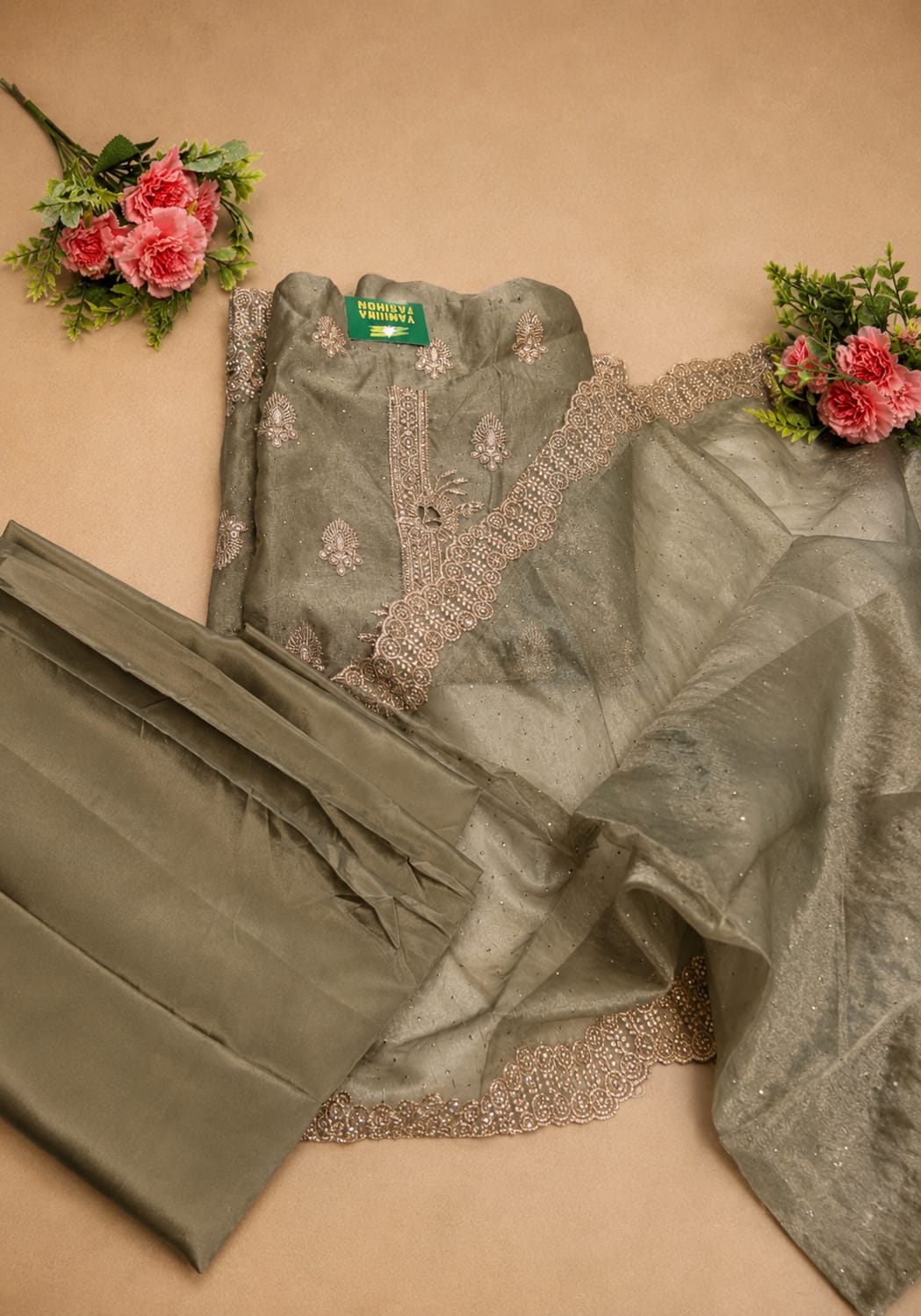 Premium Tissue Silk, delicate handwork, and three vibrant colour options come together to create an effortlessly elegant unstitched dress.